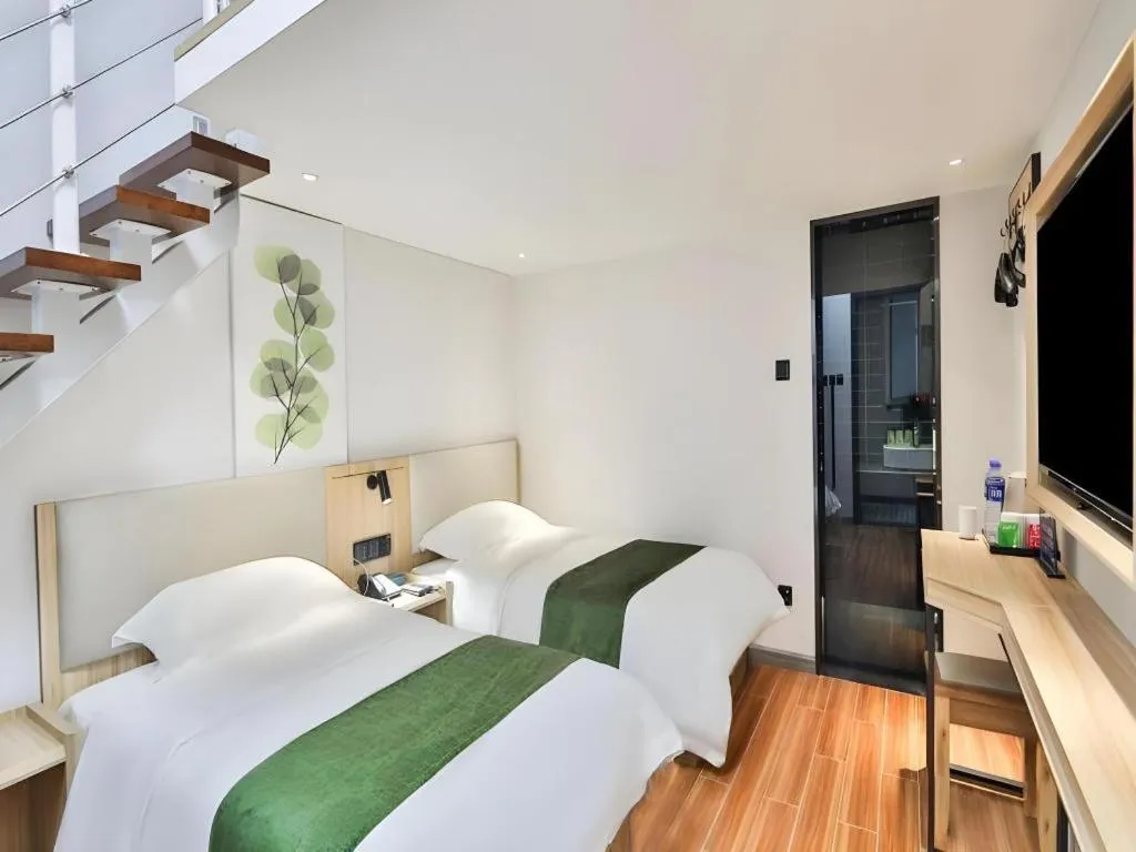 Bed in GreenTree Inn Express Beijing Dongcheng District Beixinqiao Metro Station Gui Street