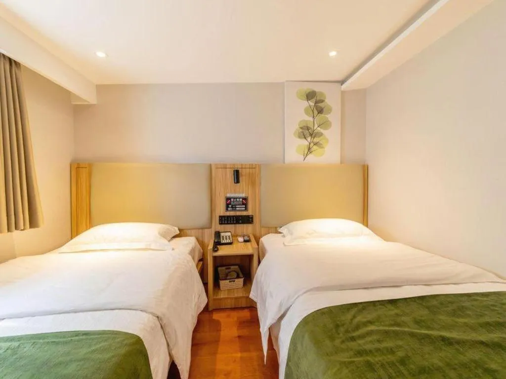 Bed in GreenTree Inn Express Beijing Dongcheng District Beixinqiao Metro Station Gui Street