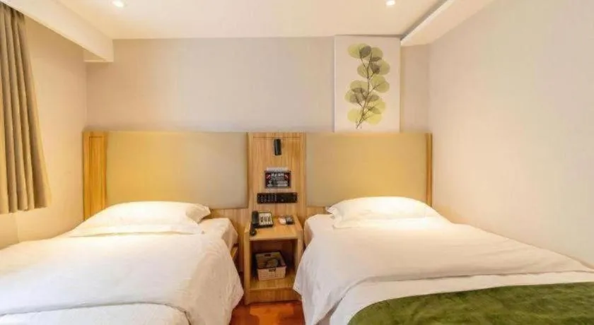 Bed in GreenTree Inn Express Beijing Dongcheng District Beixinqiao Metro Station Gui Street