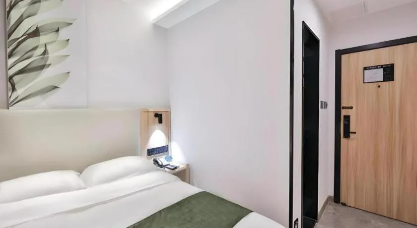 Bed in GreenTree Inn Express Beijing Dongcheng District Beixinqiao Metro Station Gui Street