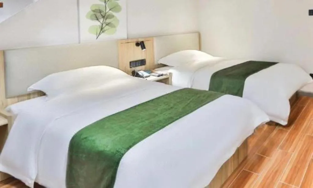 Bed in GreenTree Inn Express Beijing Dongcheng District Beixinqiao Metro Station Gui Street