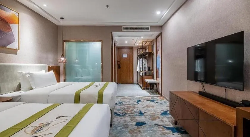 Bed in Xiangsu Boang Hotel