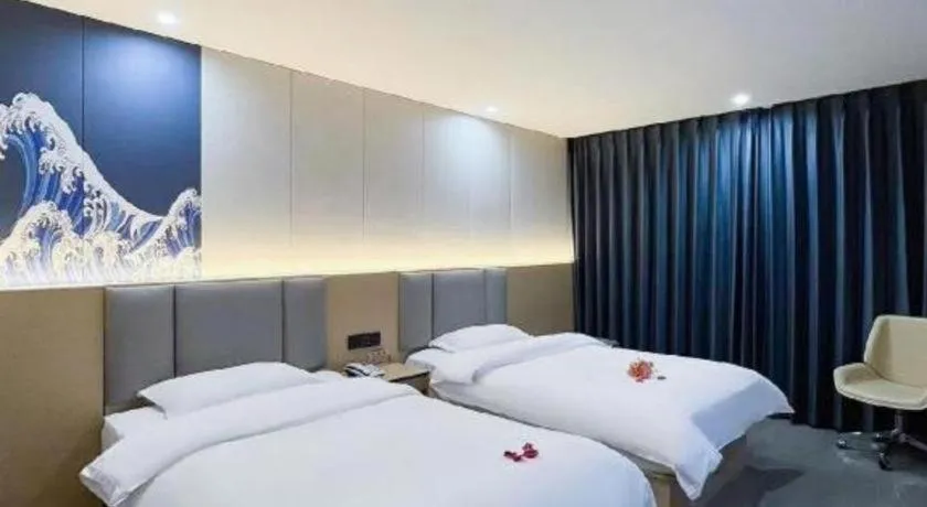 Bed in Super 8 Hotel Dingzhou Chongwen Street