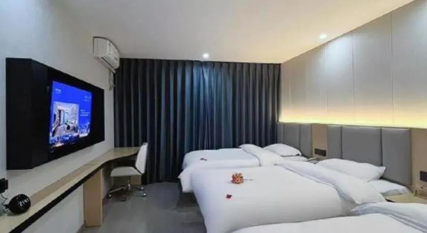 Bed in Super 8 Hotel Dingzhou Chongwen Street