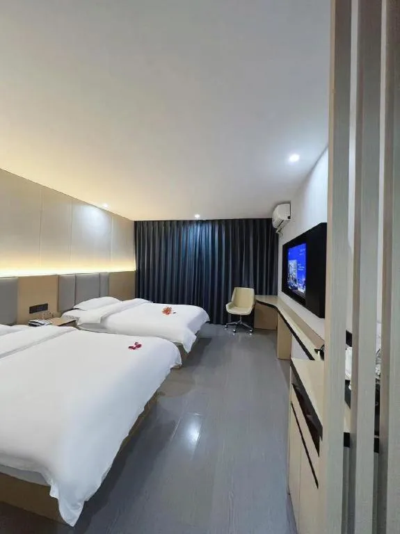 Bed in Super 8 Hotel Dingzhou Chongwen Street