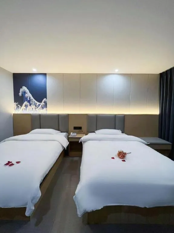 Bed in Super 8 Hotel Dingzhou Chongwen Street