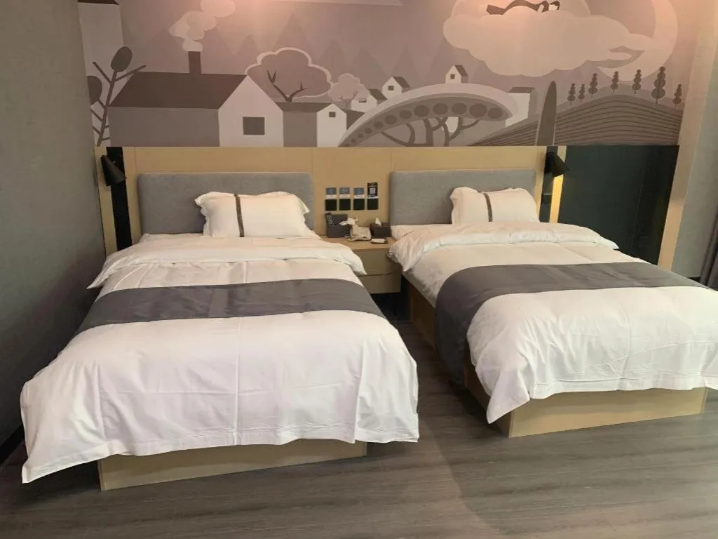 Bed in Thank Inn Jiangxi Nanchang Anyi County Fenghuangshan Industrial Park