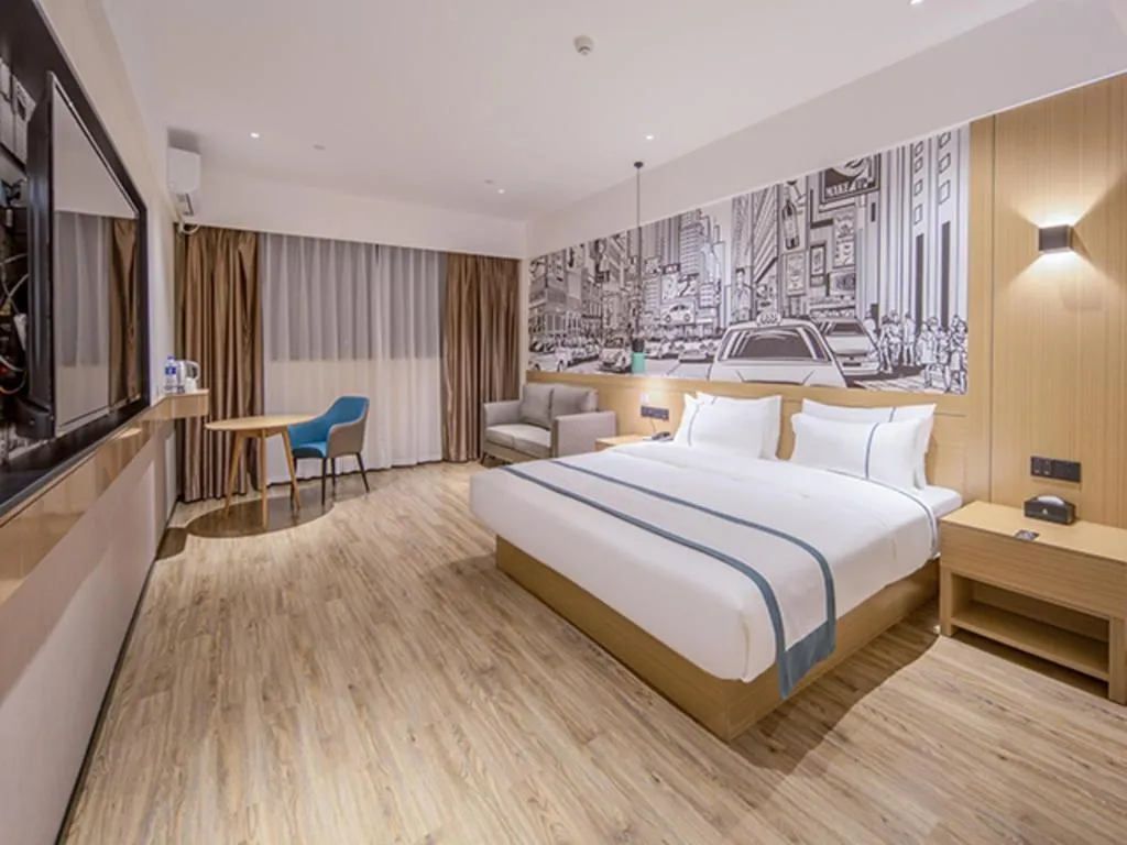 Bed in City Comfort Inn Wuzhou Xijiang Thrid Bridge