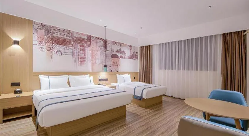 Bed in City Comfort Inn Wuzhou Xijiang Thrid Bridge