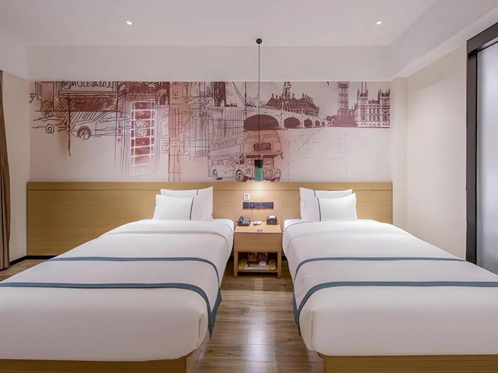 Bed in City Comfort Inn Wuzhou Xijiang Thrid Bridge