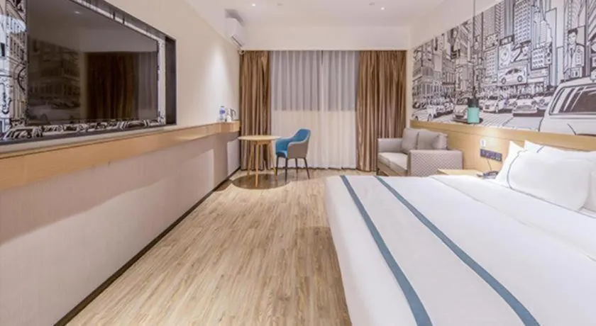 Bed in City Comfort Inn Wuzhou Xijiang Thrid Bridge