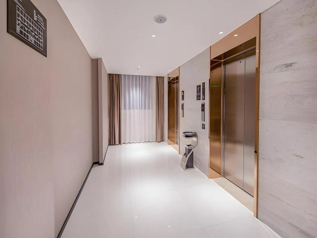 Bed in City Comfort Inn Wuzhou Xijiang Thrid Bridge