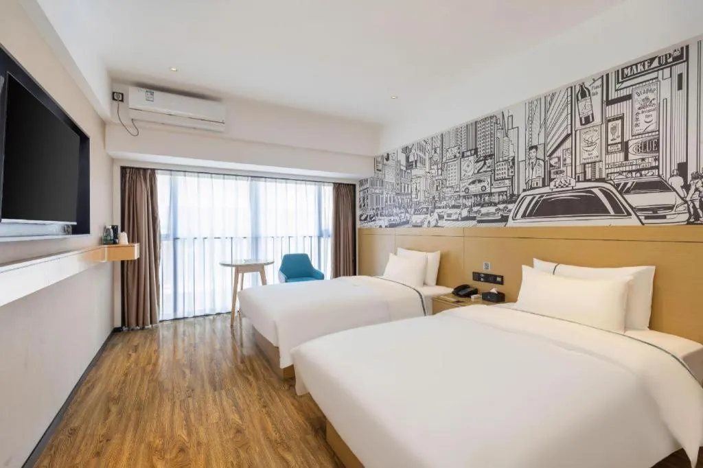 Bed in City Comfort Inn Yunfu Xinxing Juncheng Plaza