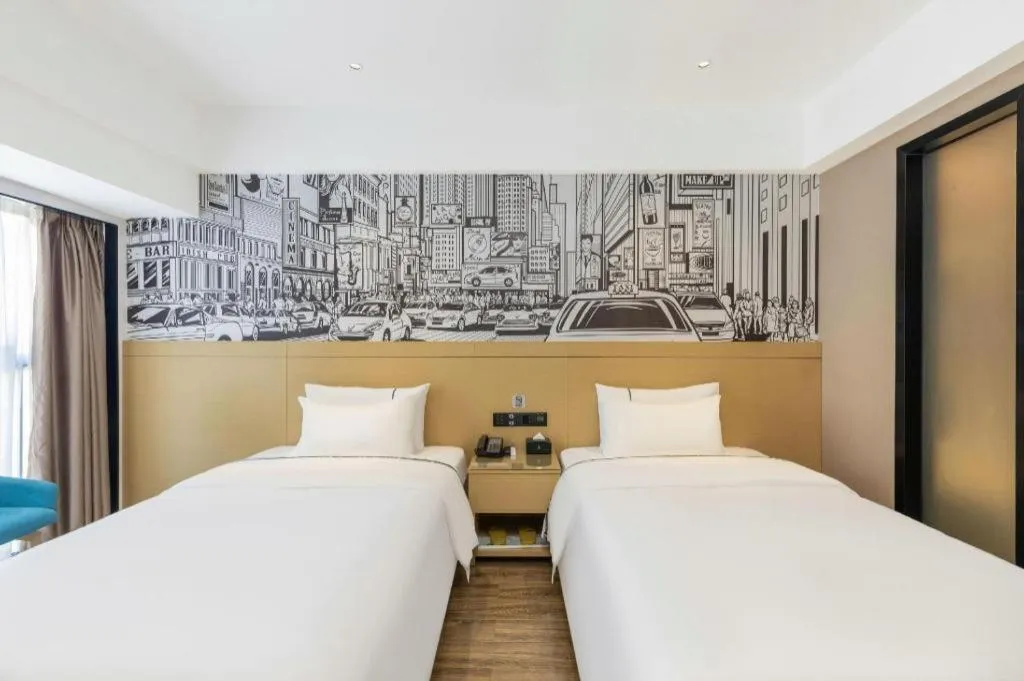 Bed in City Comfort Inn Yunfu Xinxing Juncheng Plaza