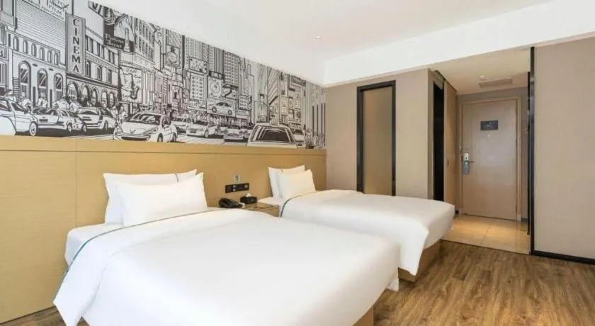 Bed in City Comfort Inn Yunfu Xinxing Juncheng Plaza