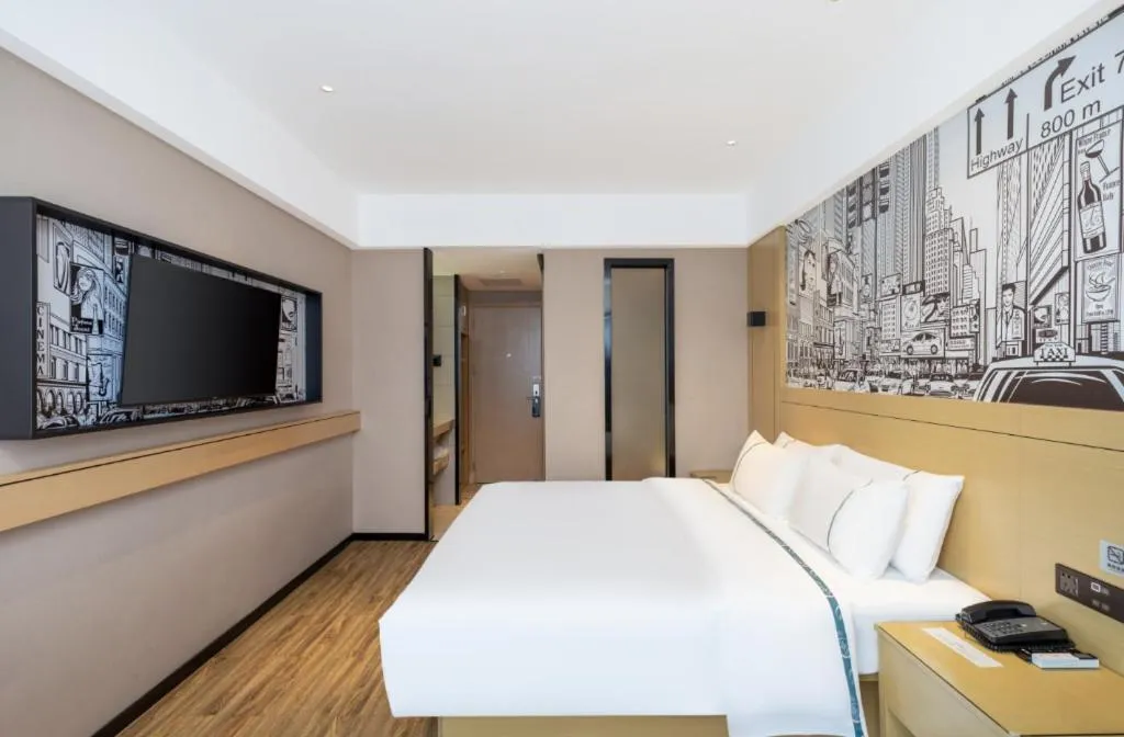 Bed in City Comfort Inn Yunfu Xinxing Juncheng Plaza