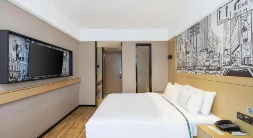 Bed in City Comfort Inn Yunfu Xinxing Juncheng Plaza