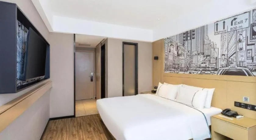 Bed in City Comfort Inn Yunfu Xinxing Juncheng Plaza