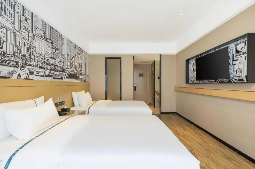 Bed in City Comfort Inn Yunfu Xinxing Juncheng Plaza