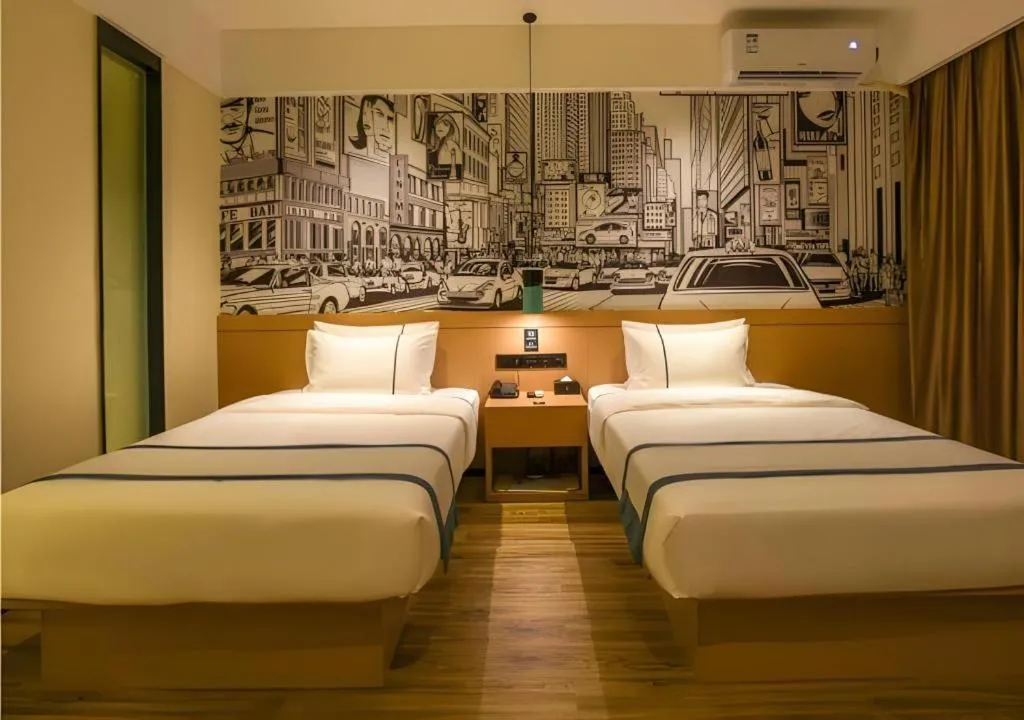 Bed in City Comfort Inn Luocheng Bus Terminal