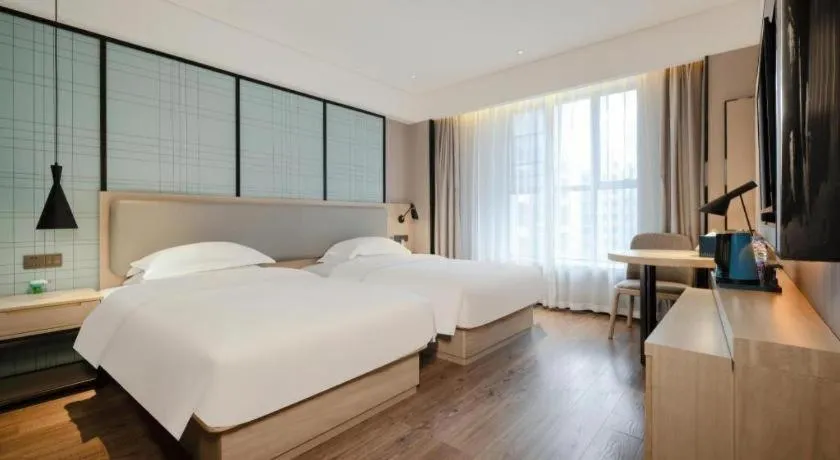 Bed in Echarm Hotel Nanning the MixC Dongmeng Business District