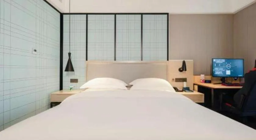 Bed in Echarm Hotel Nanning the MixC Dongmeng Business District