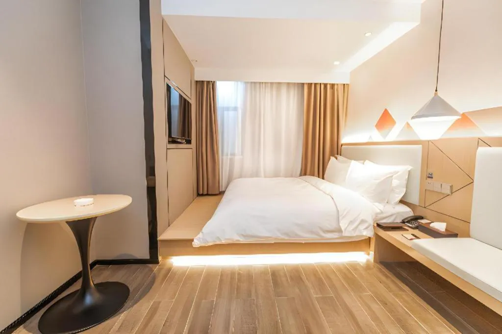 Bed in Borrman Hotel Yongzhou High Speed Railway Station