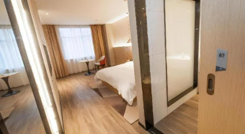 Bed in Borrman Hotel Yongzhou High Speed Railway Station