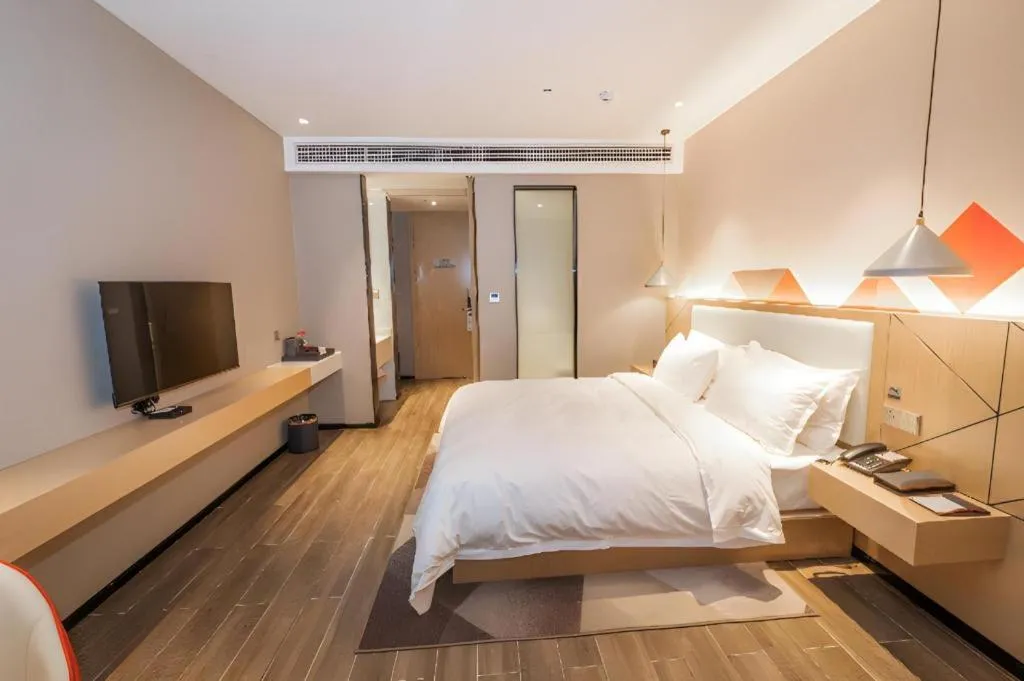 Bed in Borrman Hotel Yongzhou High Speed Railway Station