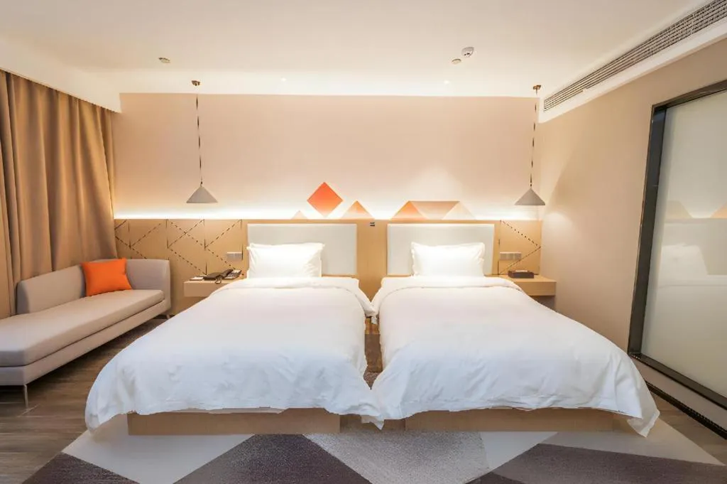 Bed in Borrman Hotel Yongzhou High Speed Railway Station