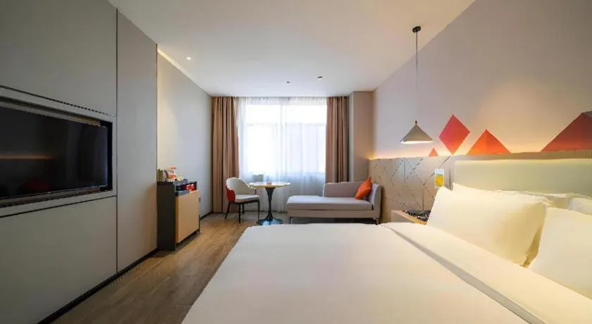 Bed in Borrman Hotel Yongzhou High Speed Railway Station