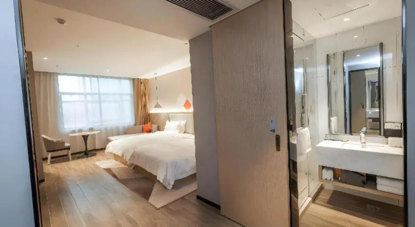 Bed in Borrman Hotel Yongzhou High Speed Railway Station