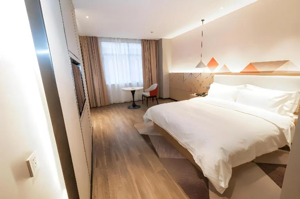 Bed in Borrman Hotel Yongzhou High Speed Railway Station