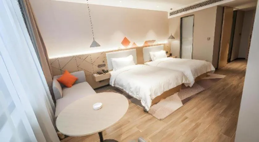 Bed in Borrman Hotel Yongzhou High Speed Railway Station