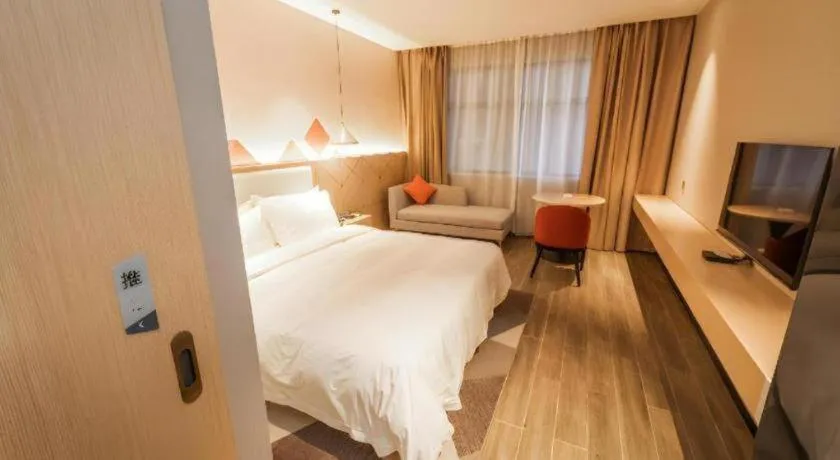 Bed in Borrman Hotel Yongzhou High Speed Railway Station