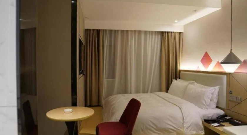 Bed in Borrman Hotel Yongzhou High Speed Railway Station