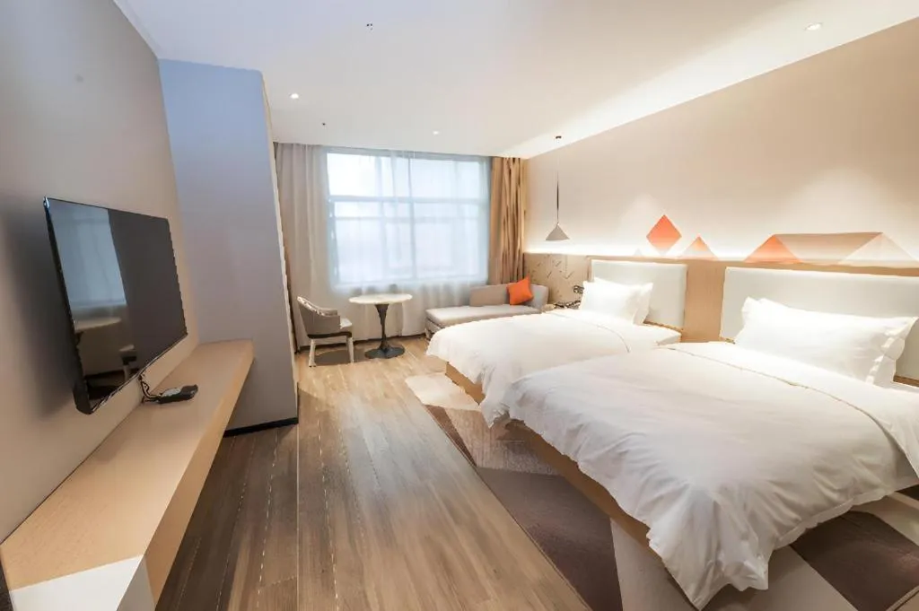 Bed in Borrman Hotel Yongzhou High Speed Railway Station