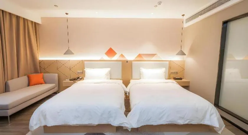 Bed in Borrman Hotel Yongzhou High Speed Railway Station