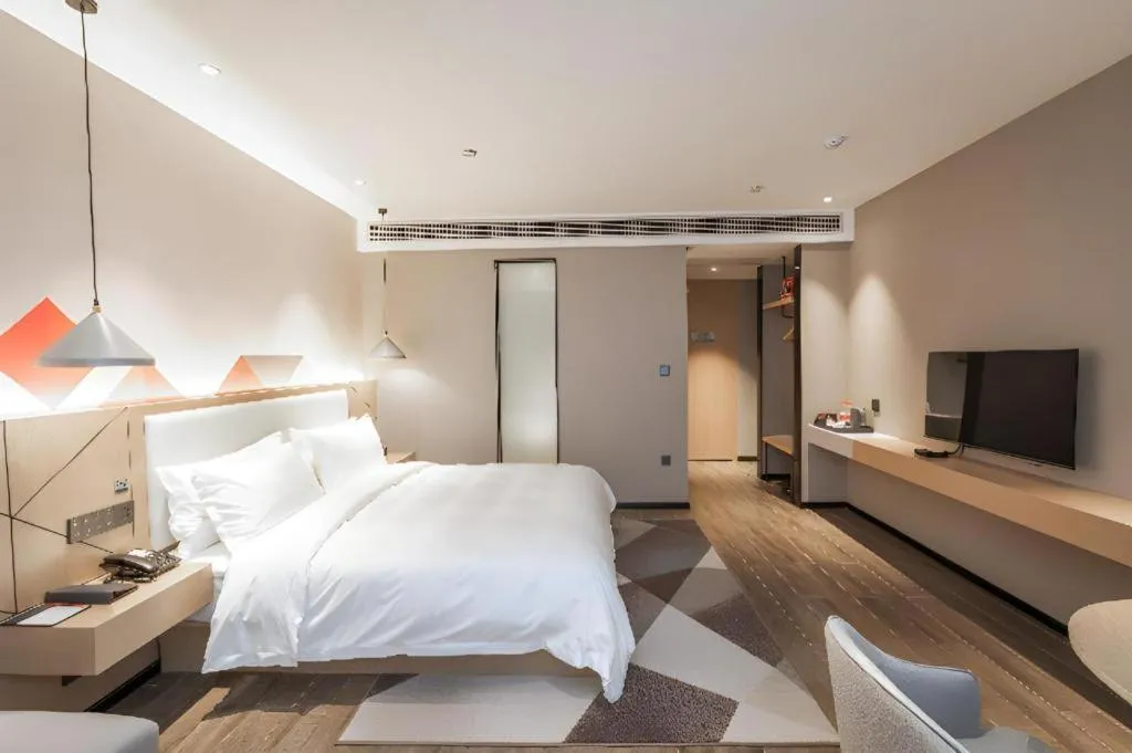 Bed in Borrman Hotel Yongzhou High Speed Railway Station