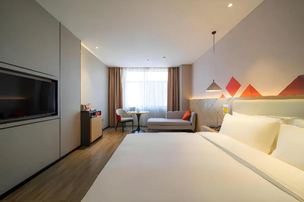 Bed in Borrman Hotel Yongzhou High Speed Railway Station