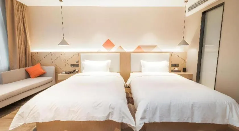 Bed in Borrman Hotel Yongzhou High Speed Railway Station