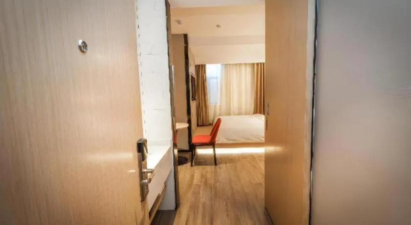 Bed in Borrman Hotel Yongzhou High Speed Railway Station