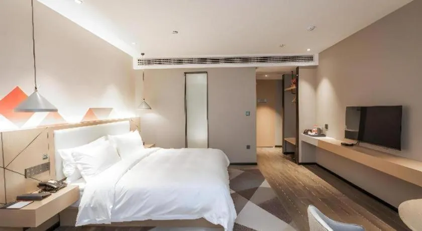 Bed in Borrman Hotel Yongzhou High Speed Railway Station