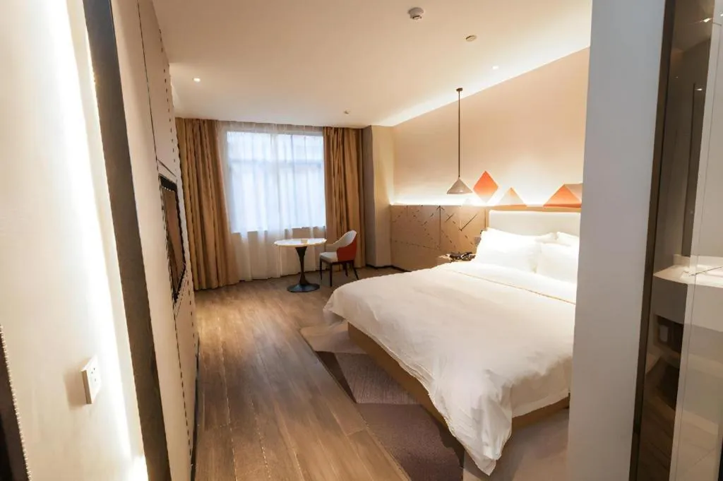 Bed in Borrman Hotel Yongzhou High Speed Railway Station