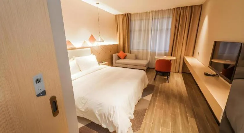 Bed in Borrman Hotel Yongzhou High Speed Railway Station