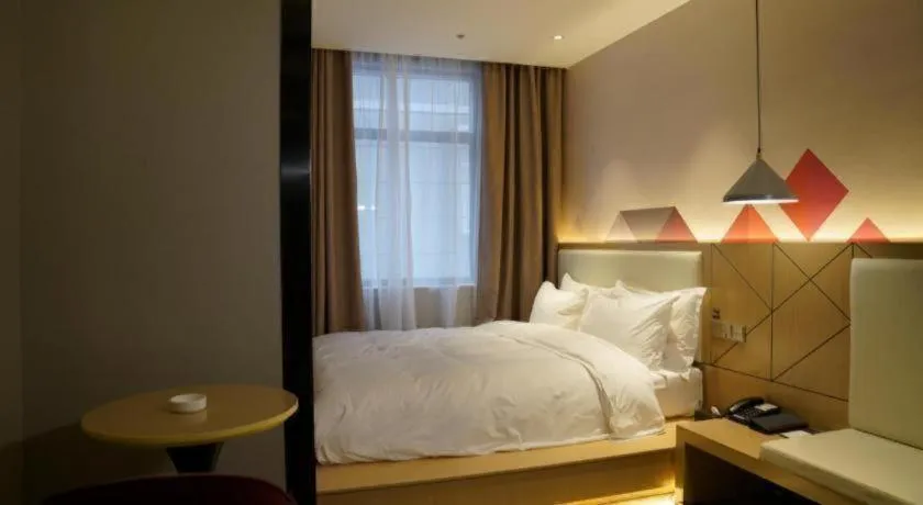 Bed in Borrman Hotel Yongzhou High Speed Railway Station