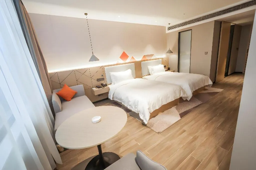 Bed in Borrman Hotel Yongzhou High Speed Railway Station