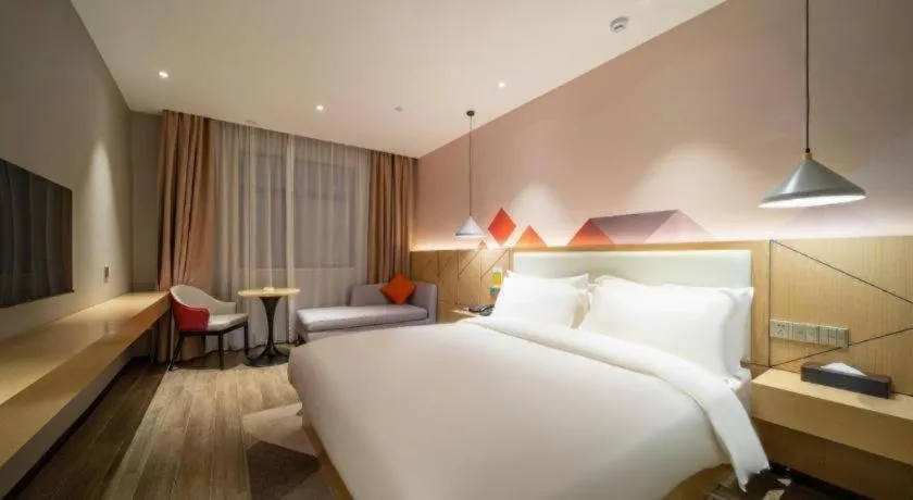 Bed in Borrman Hotel Yongzhou High Speed Railway Station