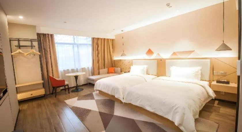 Bed in Borrman Hotel Yongzhou High Speed Railway Station