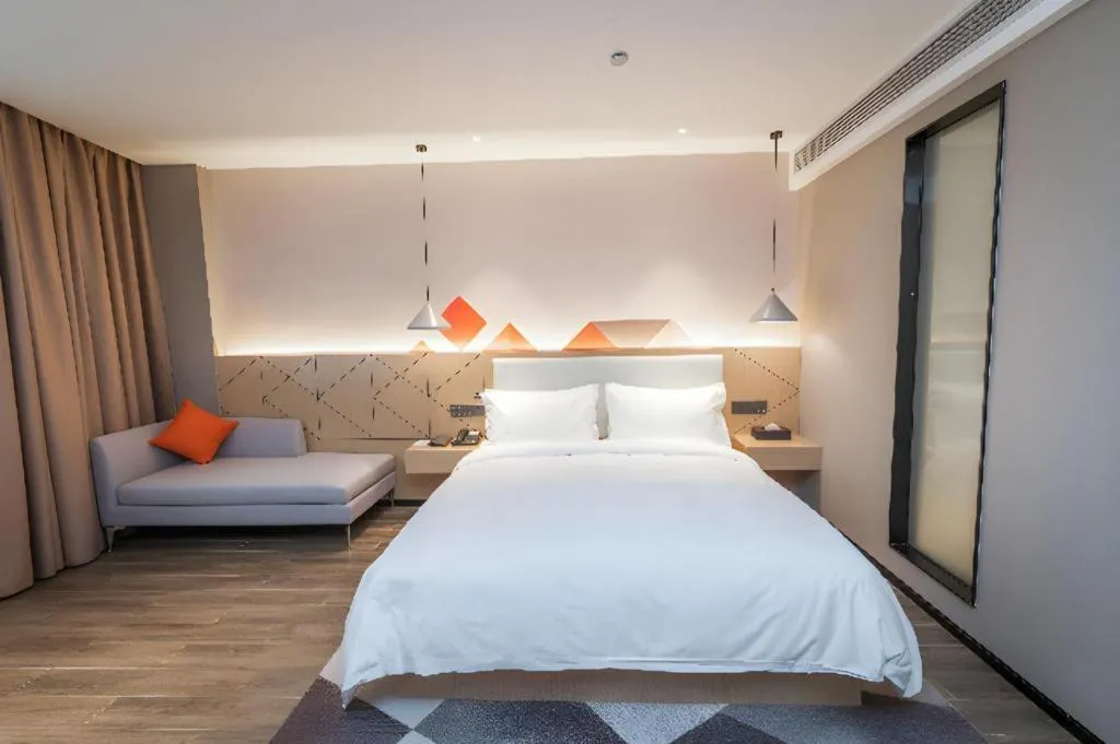 Bed in Borrman Hotel Yongzhou High Speed Railway Station